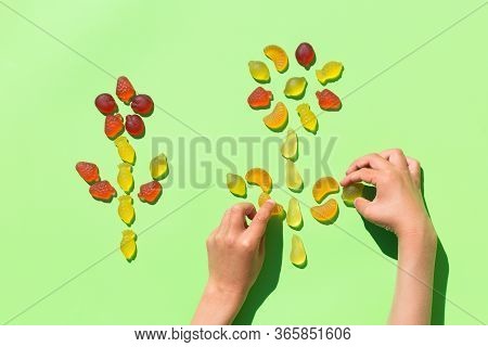 Childs Hands Making Picture With Jelly Candies, Arts And Crafts