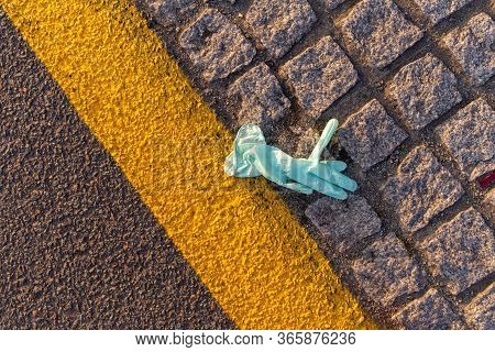 Lost Disposable Gloves On Graund, Waste Ppe On The Street, Enviromental