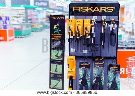 Tyumen, Russia-may 04, 2020: Store Sells Branded Fiskars. Scissors, Secateurs, Stand In A Hypermarke