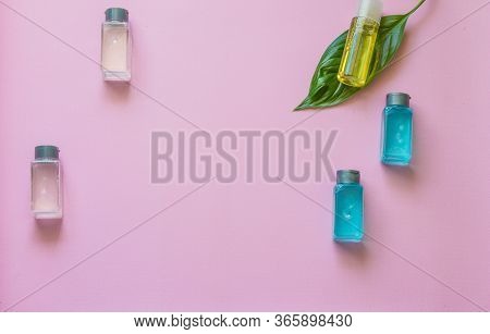 Spa Cosmetics Set. Copyspace For Text. Flatlay On Pink Background.
