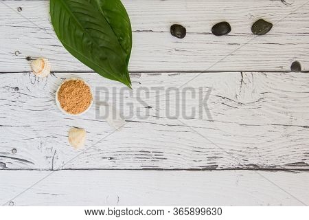 Spa Cosmetics Set. Copyspace For Text. Flatlay On Wooden Background.