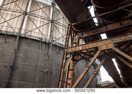 Rusty Pipes And Industrial Building In Ostrava Dolni Vitkovice Region In Czech Republic