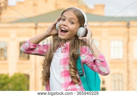 Singing Lesson. Happy Singer Outdoors. Singing Song. Little Girl Enjoy Singing To Music. Music Schoo