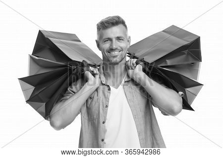 Avid Shopaholic. Happy Man With Packages After Shopping. Handsome Man Care Heavy Shopping Bags. Buy 
