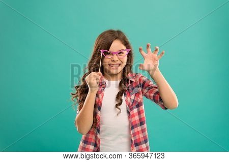 Childhood Happiness. Child In Good And Positive Mood. Looking Smart In Glasses. Aggressive Small Gir