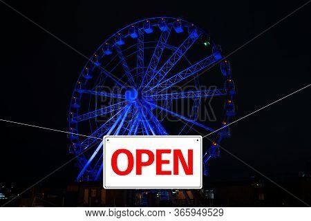 It Is Open Again. Out Of Isolation Due To Pandemic. Passage To Ferris Wheel Is Open. Concept Of Open