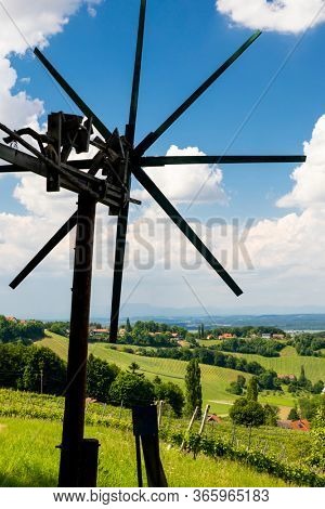 vineyard with windmill called klapotetz in south of Styria, Austria