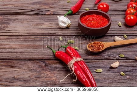 Ajvar Or Pindjur Red Vegetable Spread Or Pepper Paprika And Tomato Mousse In A Clay Bowl And Ingredi