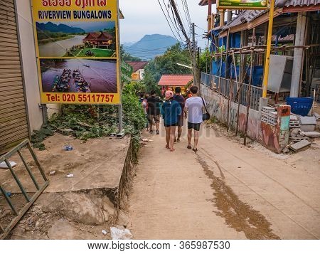 Vangvieng/lao-4 Dec 2017:unacquainted People Walking On Vangvieng Downtown In Lao.vangvieng City The