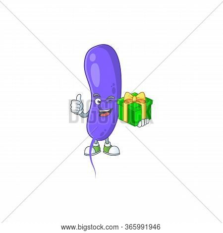 Happy Smiley Cholerae Cartoon Mascot Design With A Gift Box