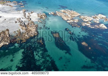 Aerial View Of Rocks At Cloughcorr Beach On Arranmore Island In County Donegal, Republic Of Ireland