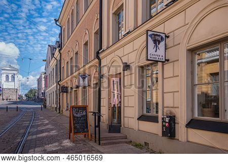 Helsinki, Finland - July 19, 2022: Yellow Facade And Entrance To El Fant Coffee And Wine Bar On Kata
