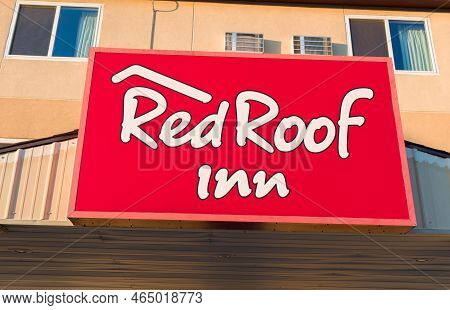Red Roof Inn Exterior Sign And Trademark Logo
