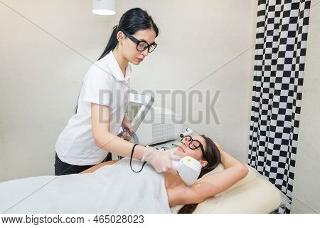 Laser Hair Removal And Cosmetology In A Beauty Salon. Hair Removal Procedure. The Concept Of Laser H