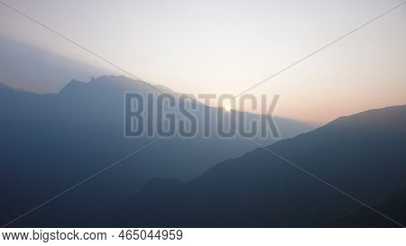 Amdes Sky And Mountains With Sun Beams