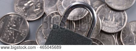 Close-up Of Padlock On Coins, Financial Security And Protection Finance. Keep Savings In Secure Plac