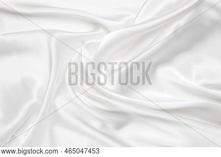 Abstract White Fabric Texture Background. Cloth Soft Wave. Creases Of Satin, Silk, And Cotton.