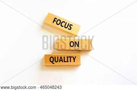 Focus On Quality Symbol. Concept Words Focus On Quality On Blocks On Beautiful White Table White Bac