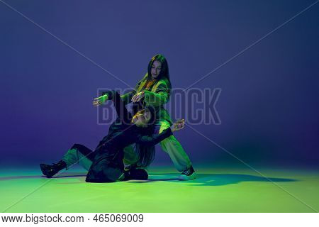 Two Dancers, Stylish Fashionable Dance Couple Dancing Contemporary Dance On Colorful Gradient Blue-g