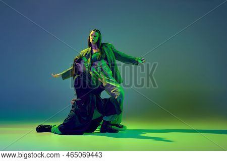 Two Dancers, Stylish Fashionable Dance Couple Dancing Contemporary Dance On Colorful Gradient Blue-g