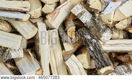 Finely Chopped And Stacked Firewood. Stacks Of Firewood. Preparation Of Firewood For The Winter. Fir