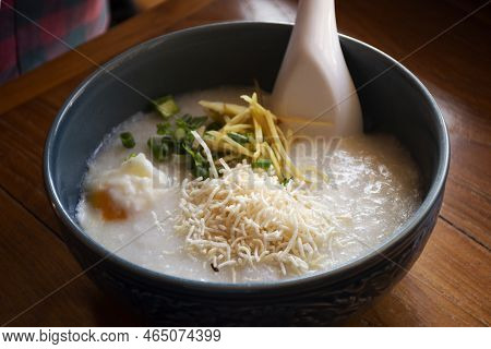 Breakfast Traditional Chinese Food Style Rice Porridge Congee With Side Dish Herb Vegetable For Thai