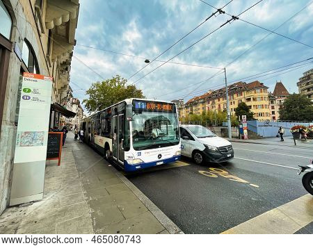 Geneva, Switzerland - September 15 2021: A Bus Of The Tpg Is Stopping At A Bus Stop To Let Passenger