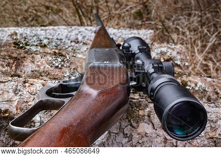 Detail Shot Of Lever-action Hunting Rifle With Scope