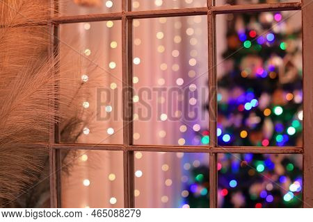 Christmas Lights Are Reflected In The Mirror.