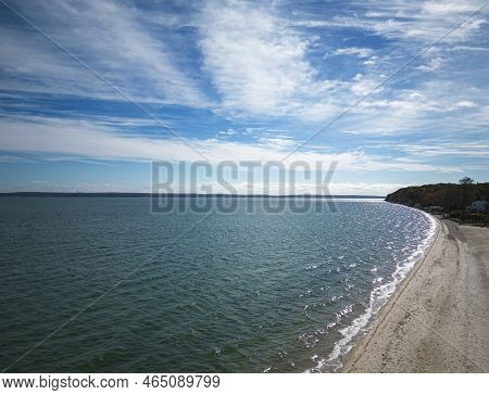 Drone View Of A Beach On The East Side Of Nassau Point And Little Peconic Bay With Wispy Clouds And 