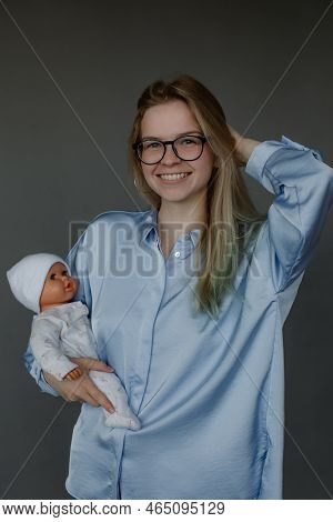 Happy Future Mother Take Birth Preparation Course, Gray Wall Background, Free Copy Space. Successful