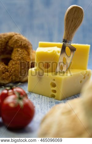 Emmental, Emmentaler, Or Emmenthal A Swiss-type Or Alpine Cheese. On Table.
