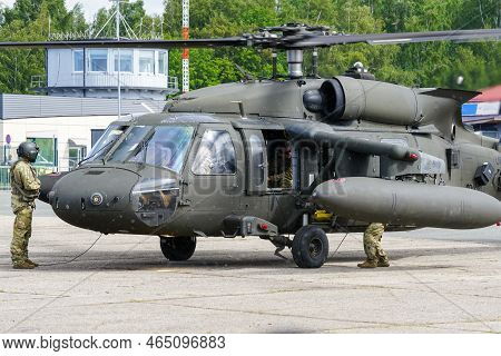 Liepaja, Latvia - August 7, 2022: Us Army Sikorsky Uh-60 Black Hawk Military Helicopter With Crew Af