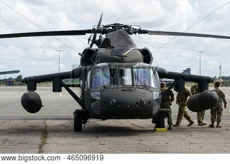 Liepaja, Latvia - August 7, 2022: Us Army Sikorsky Uh-60 Black Hawk Military Helicopter With Crew Af