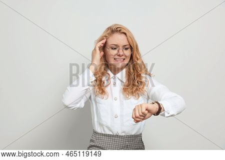 Emotional Businesswoman In Turmoil Over Being Late On White Background