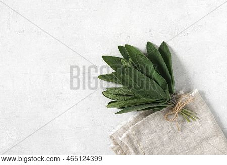 Bunch Of Fresh Organic Sage On Linen Napkin. Seasonings And . Selective Focus, Copy Space