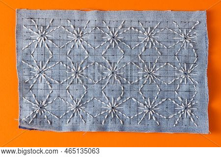 Sashiko Embroidery Sewing Stitch Blue Fabric. Traditional Japanese Sewing Pattern Call Sashiko. Lear