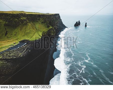 Reynisdrangar Rocks On Coastline Of Reynisfjara Black Beach, Iceland