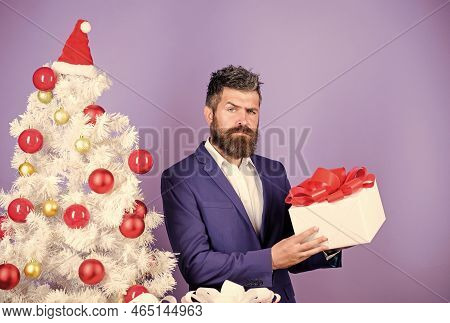 Serious Shoper. Winter Season Sales. Christmas Shopping. Bearded Man Presents From Santa. Successful