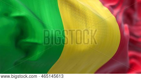 Close-up View Of The Mali National Flag Waving In The Wind. The Republic Of Mali Is A Landlocked Cou