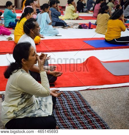 New Delhi, India, June 19 2022 -group Yoga Exercise Session For People Of Different Age Groups In Ba