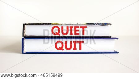 Quiet Quit Symbol. Concept Words Quiet Quit On Wooden Books. Beautiful White Table White Background.