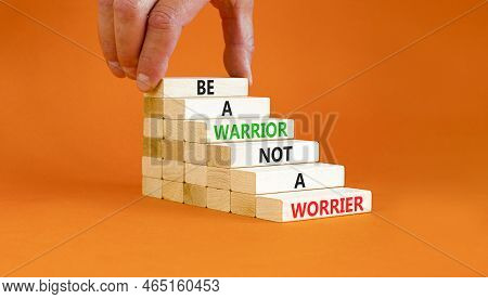 Warrior Or Worrier Symbol. Concept Words Be A Warrior Not A Worrier On Wooden Blocks On A Beautiful 
