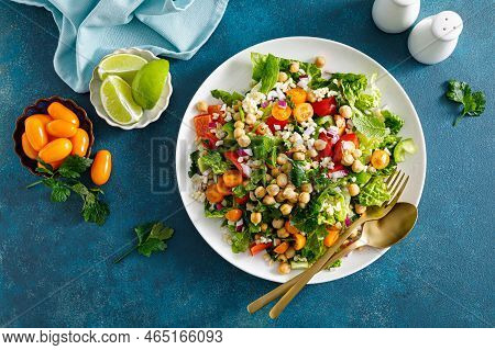 Tabbouleh Salad. Tabouli Salad With Fresh Parsley, Onions, Tomatoes, Bulgur And Chickpea. Healthy Ve