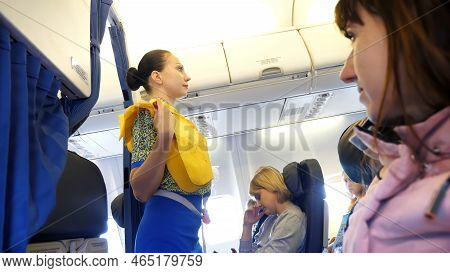 Airport Borispol, Airlines Uia - November 20, 2017: In The Cabin Of The Aircraft, The Stewardess Con
