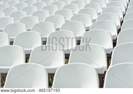 Seats Of Tribune On Sport Stadium. Concept Of Fans, Chairs For Audience, Cultural Environment Concep