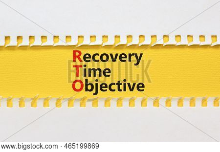 Rto Recovery Time Objective Symbol. Concept Words Rto Recovery Time Objective On Yellow Paper On A B