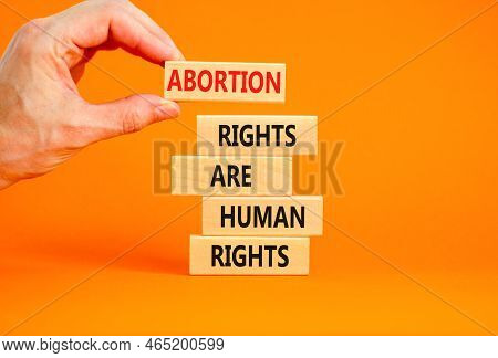 Abortion Rights Symbol. Concept Words Abortion Rights Are Human Rights On Wooden Blocks Businessman 