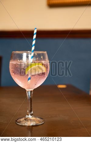 Glass Of Gin And Tonic Colorful Cocktail Served In Old Vintage Scottisch Pub, Drinking Gin In Edinbu