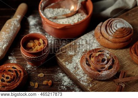 Homemade Cakes, Making Buns With Raisins And Cinnamon. Close-up